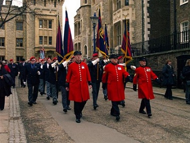 A picture of three Chelsea veterans leading the parade